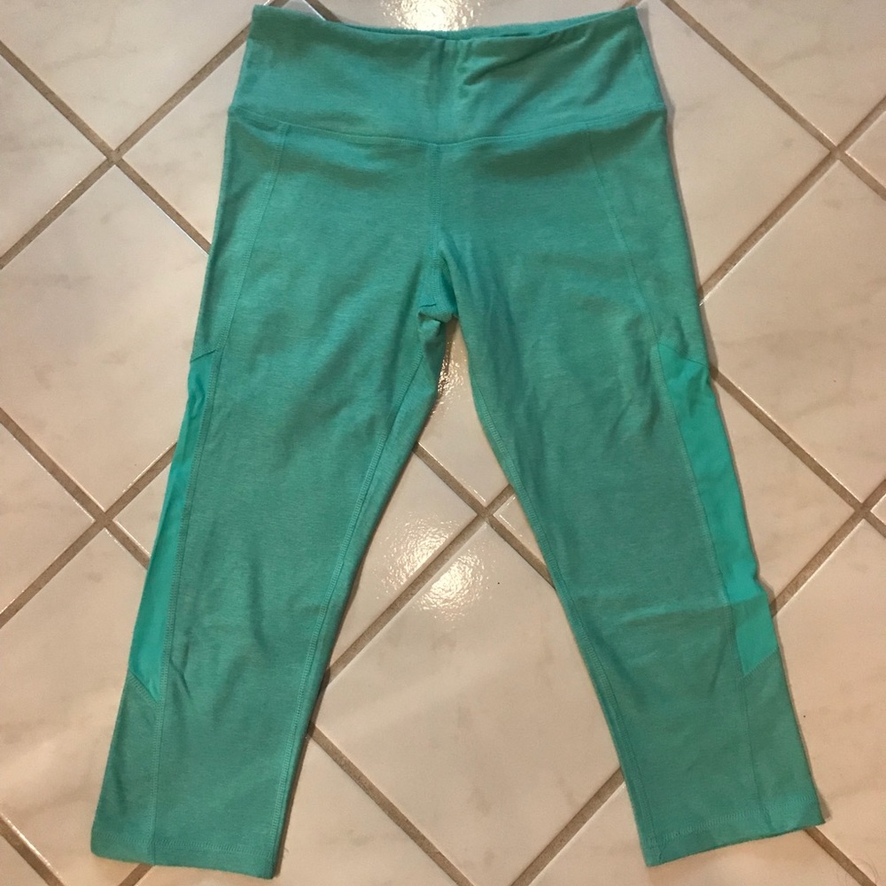 Turquoise cropped leggings with meshwork